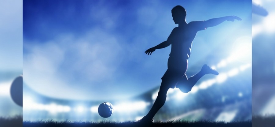 Football player getting ready for kick Football player getting ready for kick
