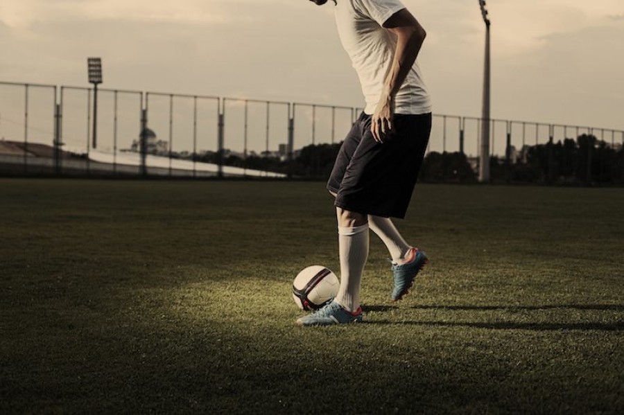 Football player showing tricks Football player showing tricks