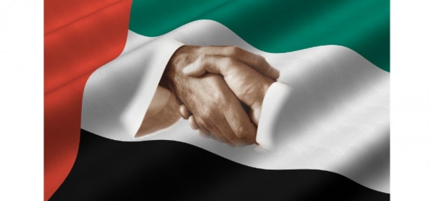 Handshake_over_UAE_Flag Handshake_over_UAE_Flag