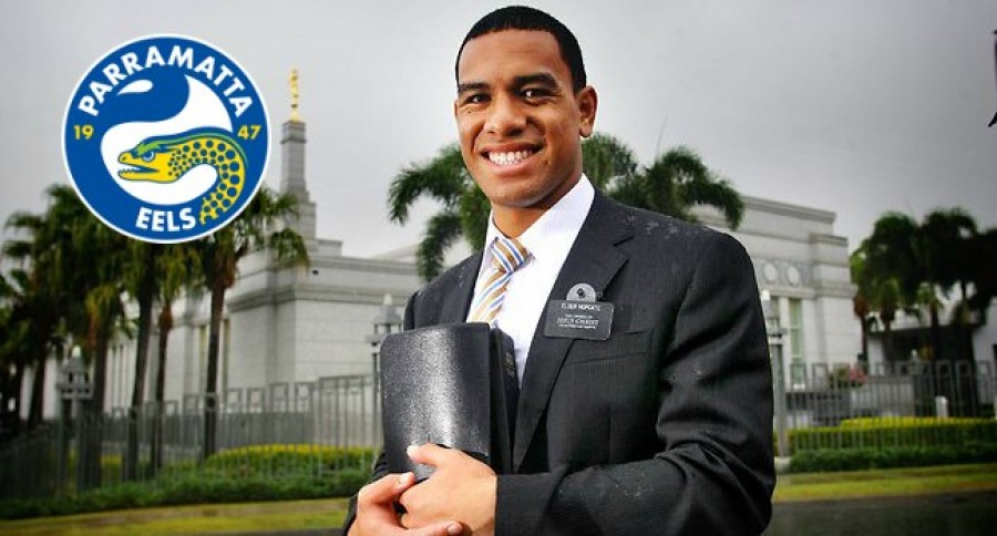 William_Hopoate_Holding_Book_and_Parramatta_Eels_Logo William_Hopoate_Holding_Book_and_Parramatta_Eels_Logo