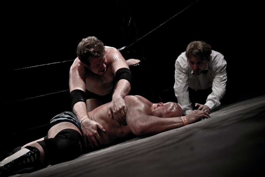 Wrestler down in ring Wrestler down in ring