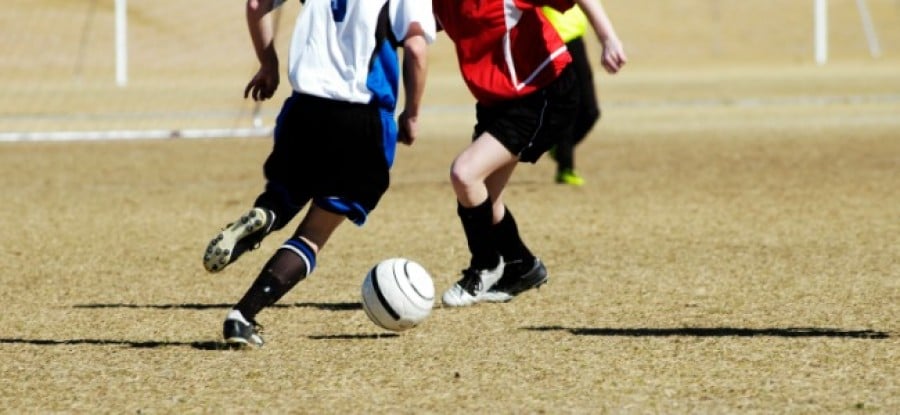 Young_Footballer_Going_for_the_Ball Young_Footballer_Going_for_the_Ball