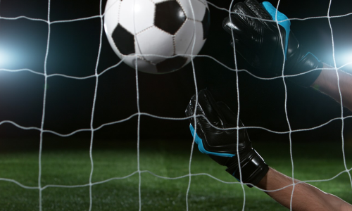 Goal keeper catching football