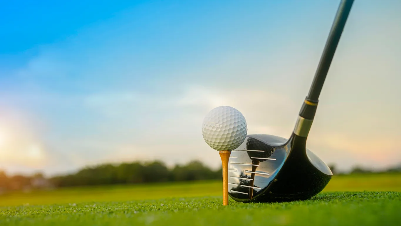 Golf on green lawn