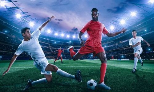 Footballer Tackling