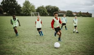 Kids playing football