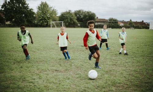 Kids playing football