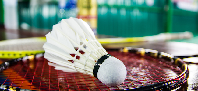 Badminton shuttle on racket