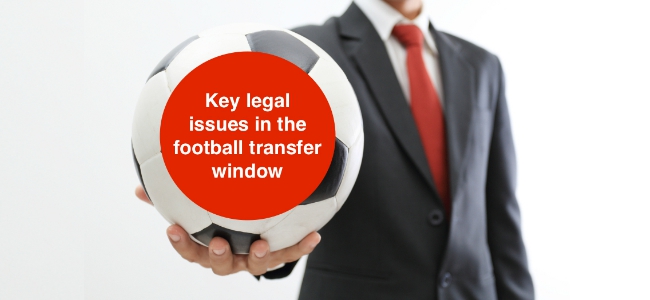 Businessman_holding_a_soccer_ball_on_white_background_key_legal_issues
