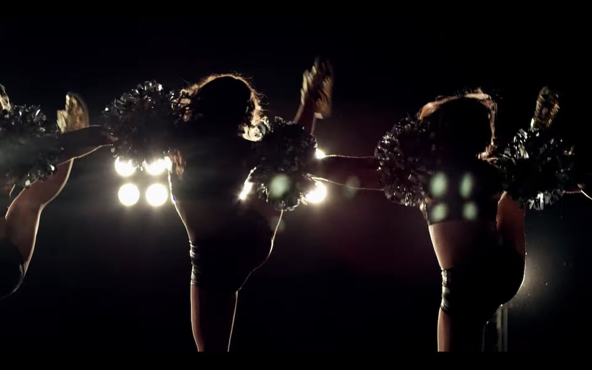 Still image of cheerleader from A Woman's Work: The NFL's Cheerleader Problem (2021) documentary