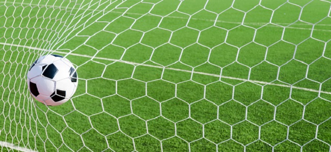 Football hitting back of goal
