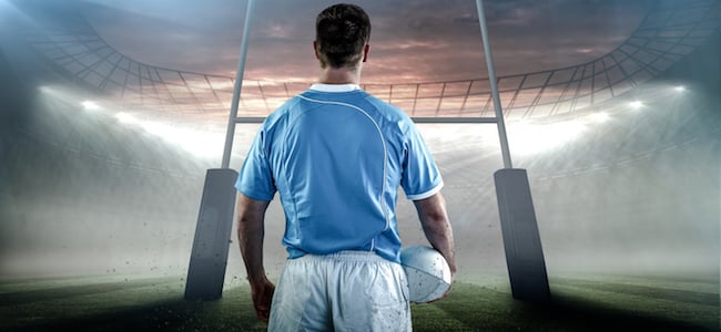 Rugby player on the field with ball