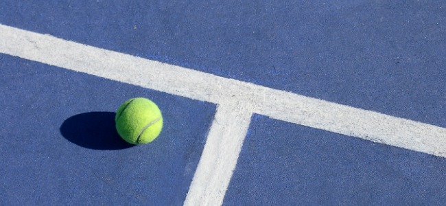 Tennis_Ball_on_Blue_Court