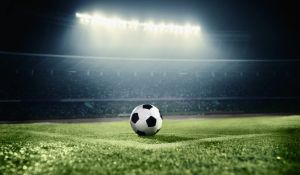 Title image of soccer ball on athletic field in stadium arena