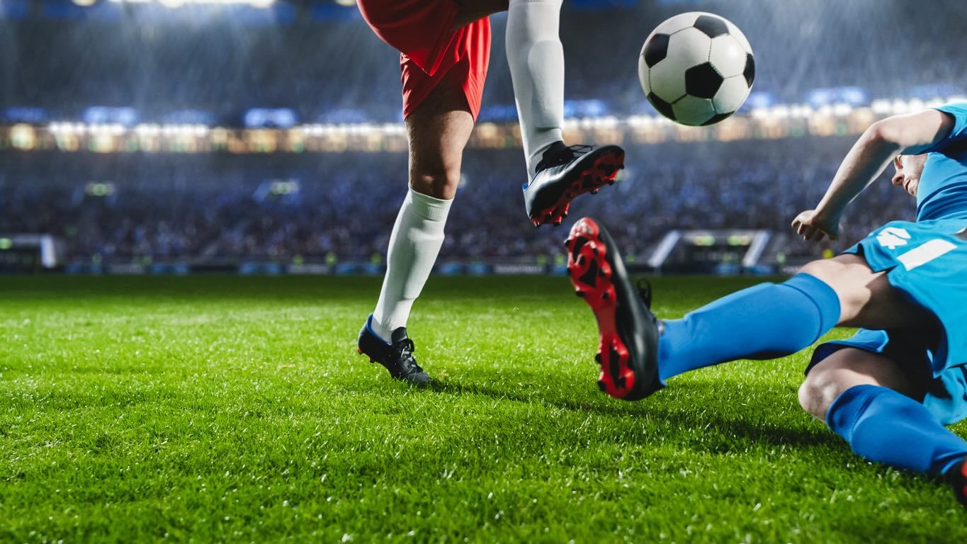 Footballer Tackling